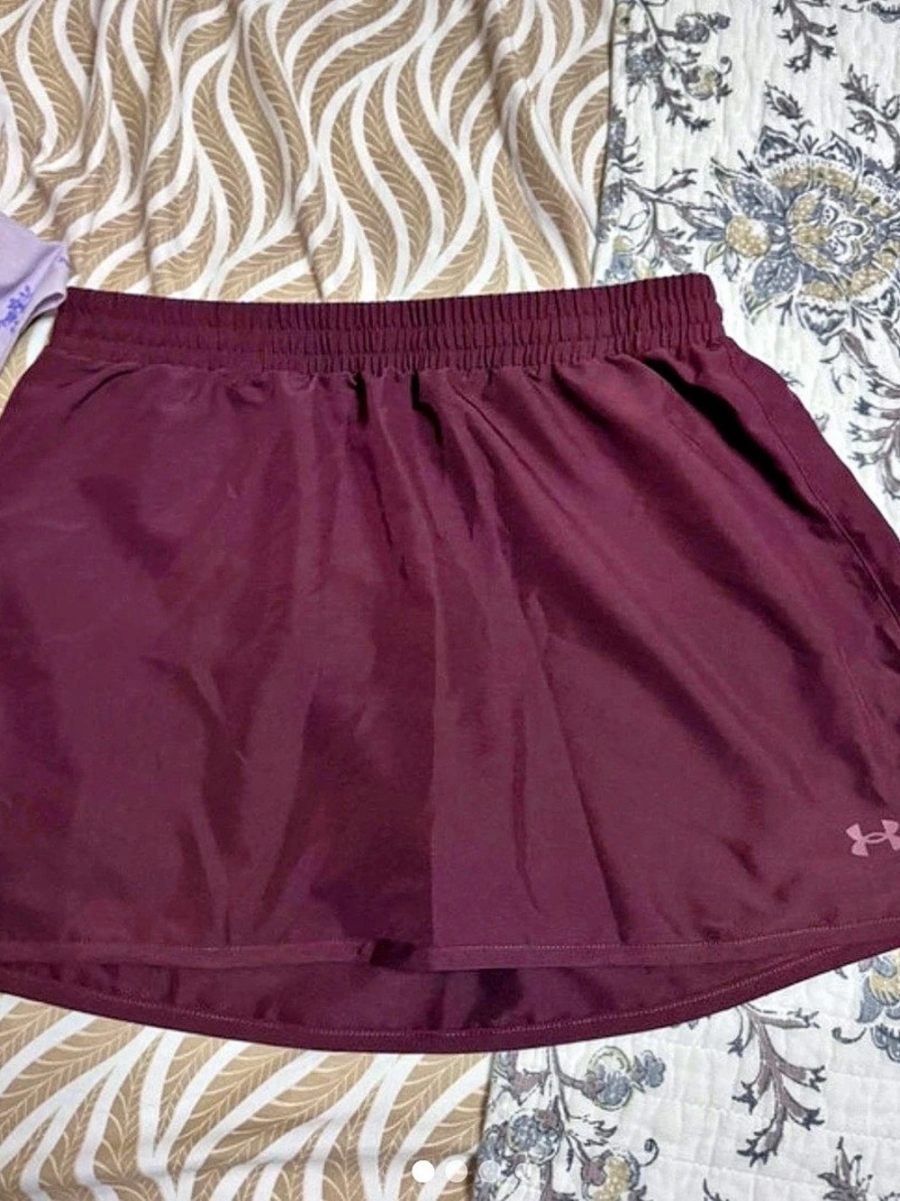 Under Armour Fly By Skort Athletic Shorts in Burgundy